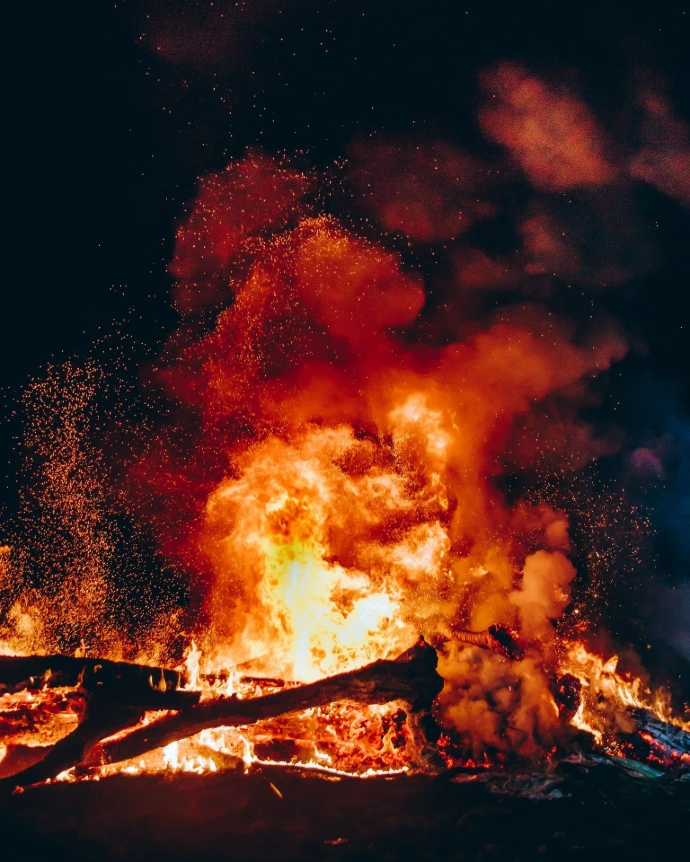 fire with black smoke during night
